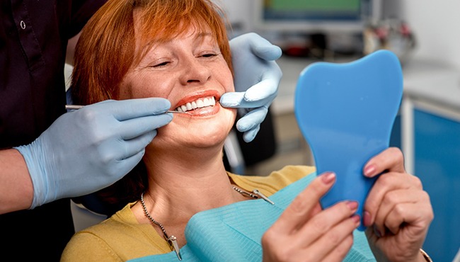 Woman smiling in the dental chair