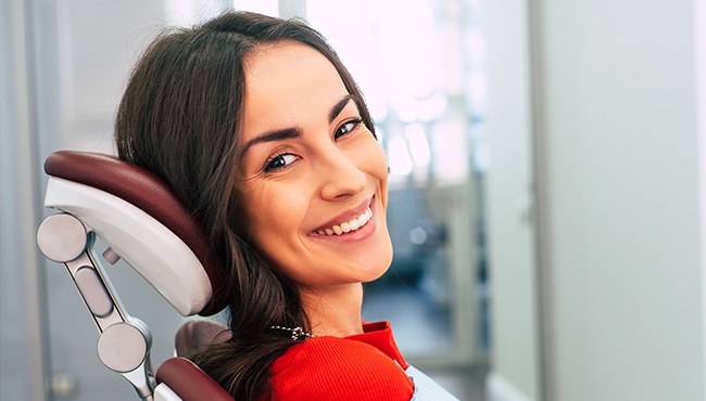 woman smiling over shoulder