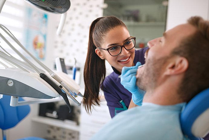 man having smile worked on