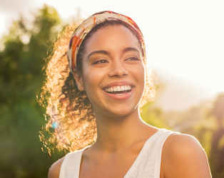 woman smiling outside