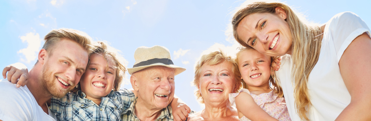 family of 6 standing in a half circle