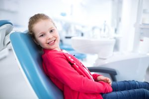 young girl at dentist