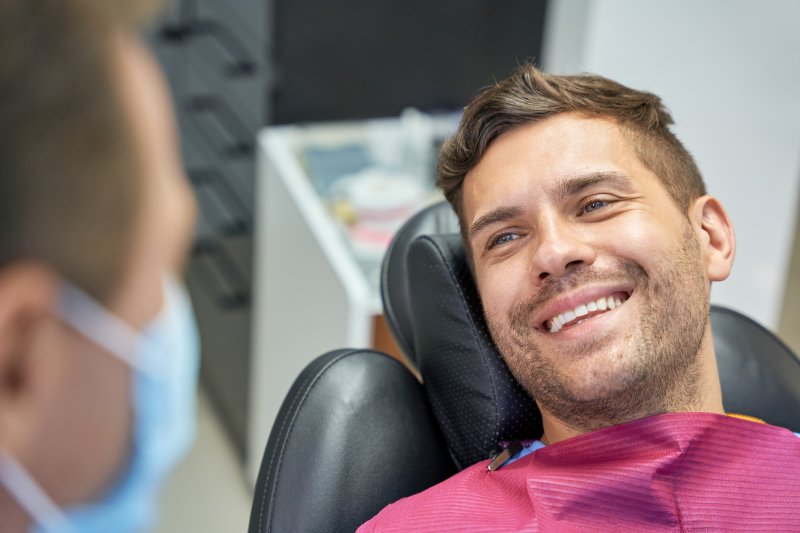 Dentist helping patient maximize dental insurance benefits in Buffalo Grove