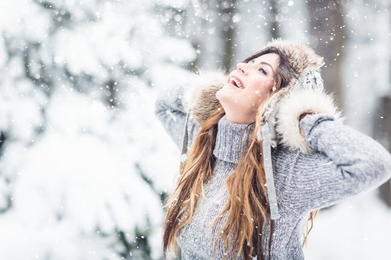 Woman smiling in the snow